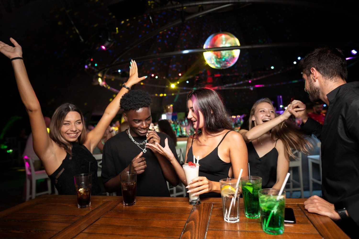 Ladies night Dubai celebration at Mojo Nightclub with vibrant dance floor and party lights